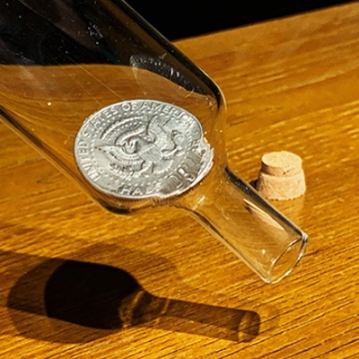 Coin in bottle - half dollar 2